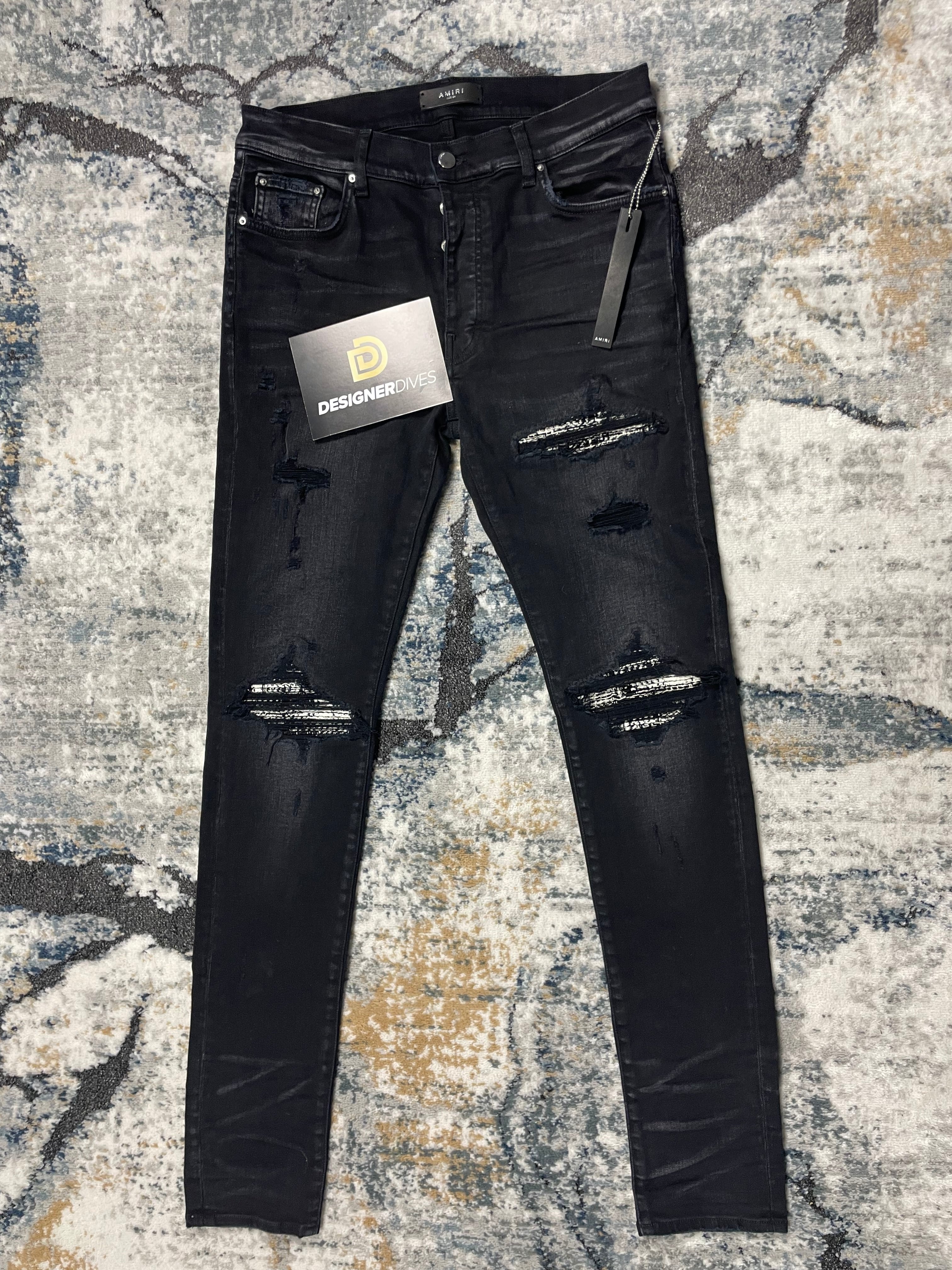 Black amiri shops jeans with patches